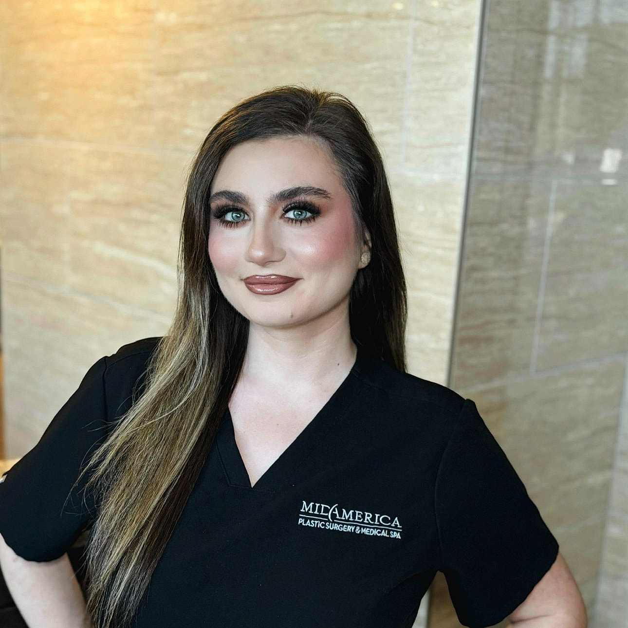 Modern waiting area with black chairs and decor