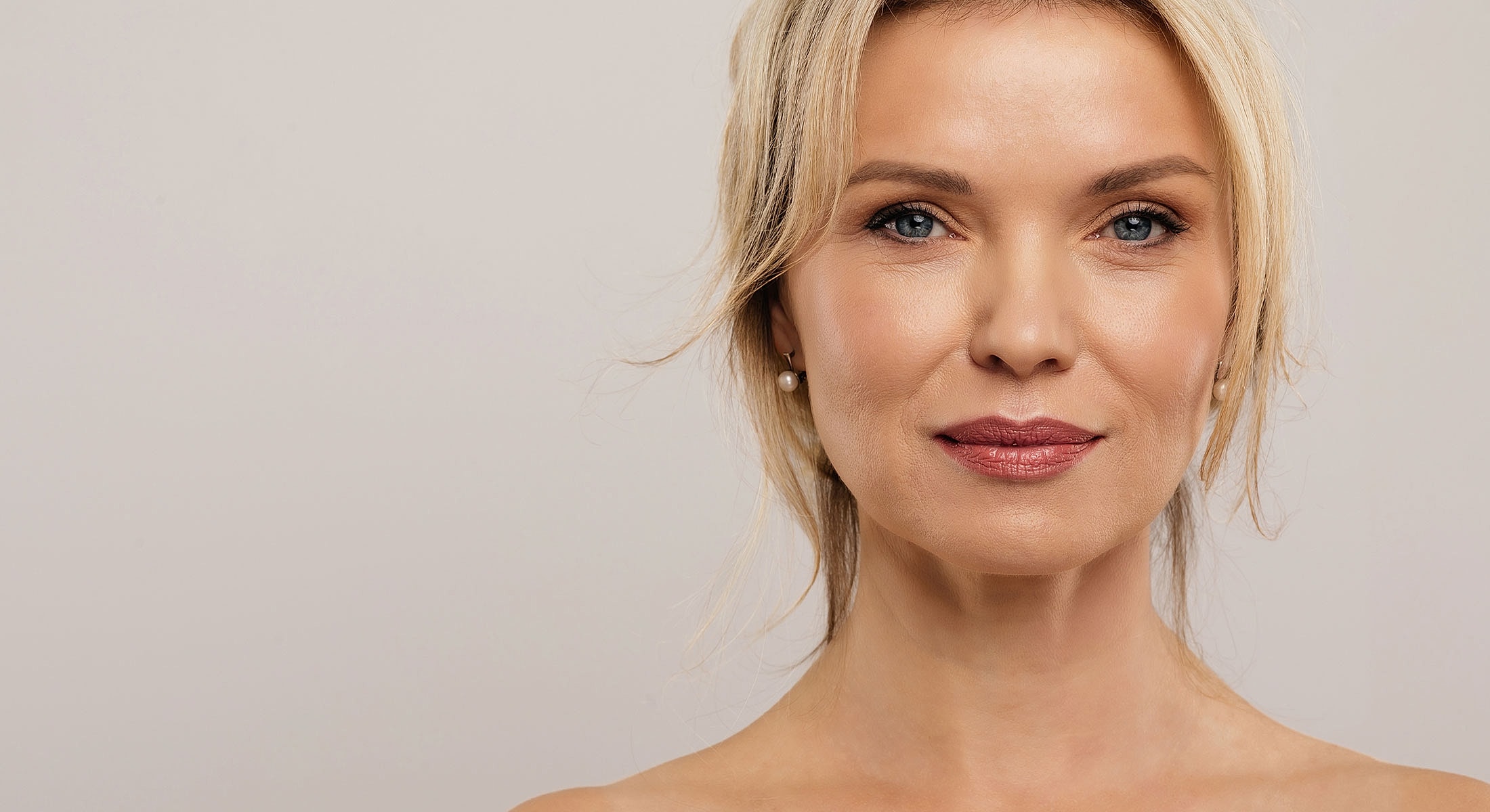 Glen Carbon lip lift model with natural makeup.